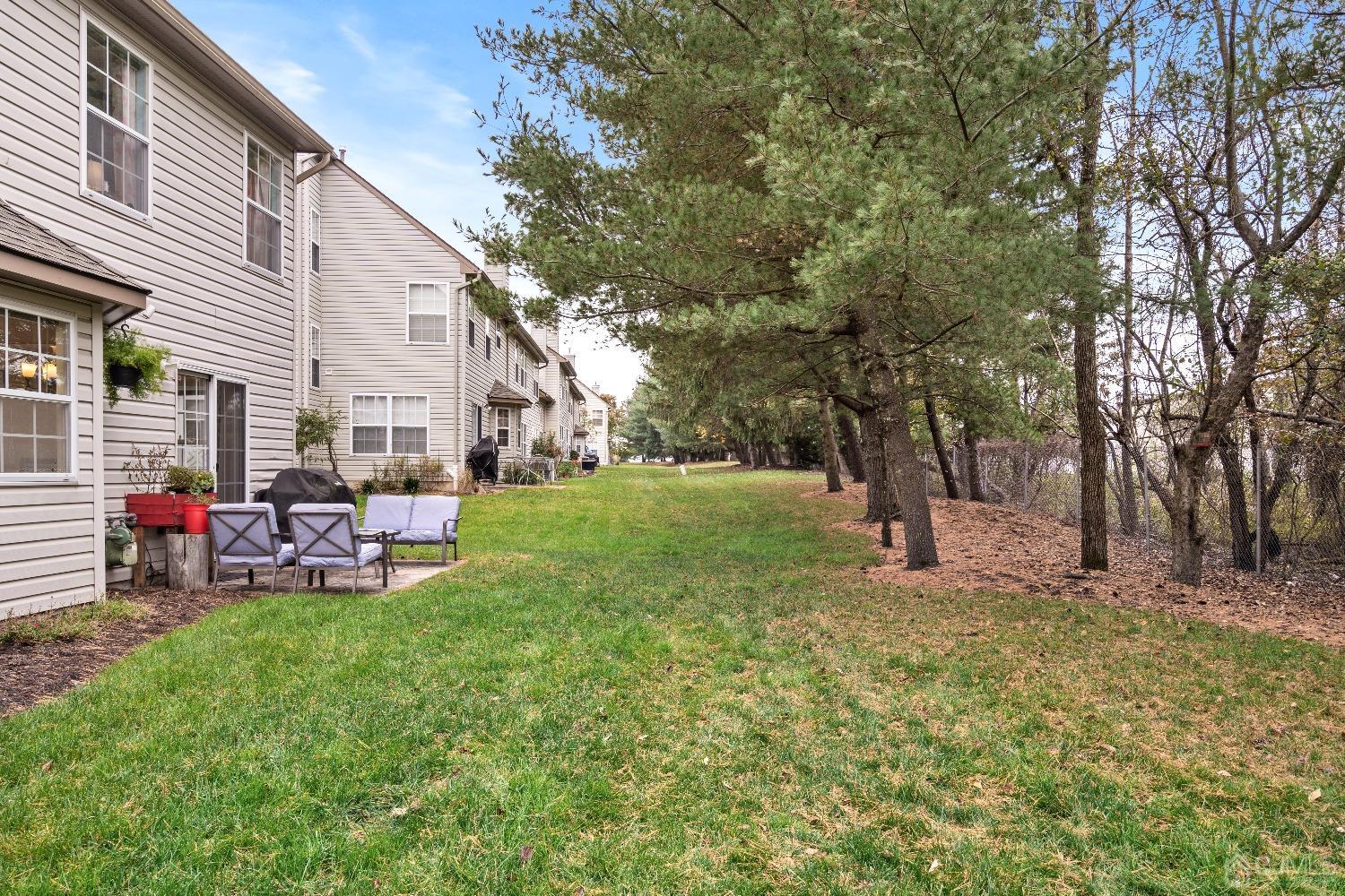 231 Nebula Road Piscataway, NJ 08854 - Photo 29 of 37 a view of a house with a backyard and sitting area