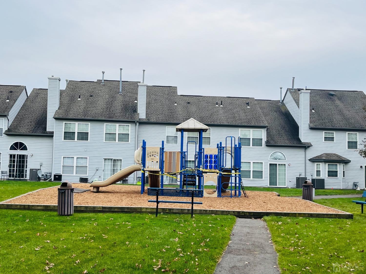 231 Nebula Road Piscataway, NJ 08854 - Photo 35 of 37 a house view with a sitting space and garden