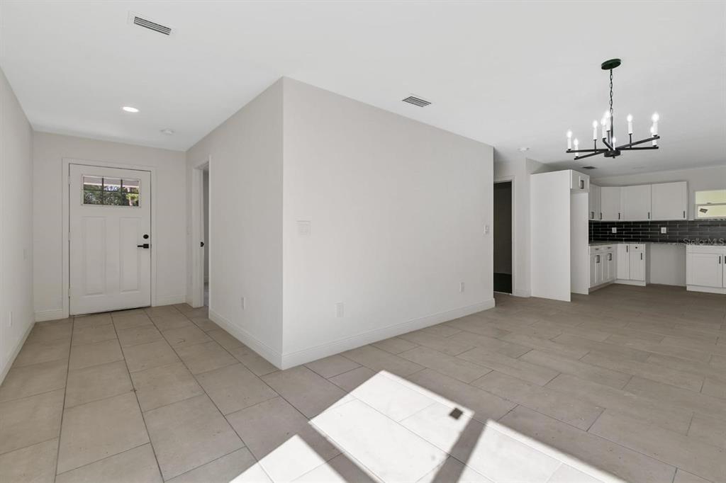 5112 Pacific Spring Hill, FL 34606 - Photo 11 of 13 a view of a livingroom with a kitchen