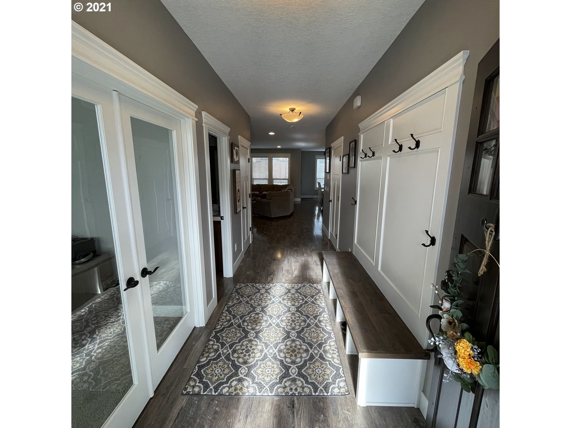 4552 North 9th Street Ridgefield, WA 98642 - Photo 2 of 29 a view of a hallway with furniture and front door