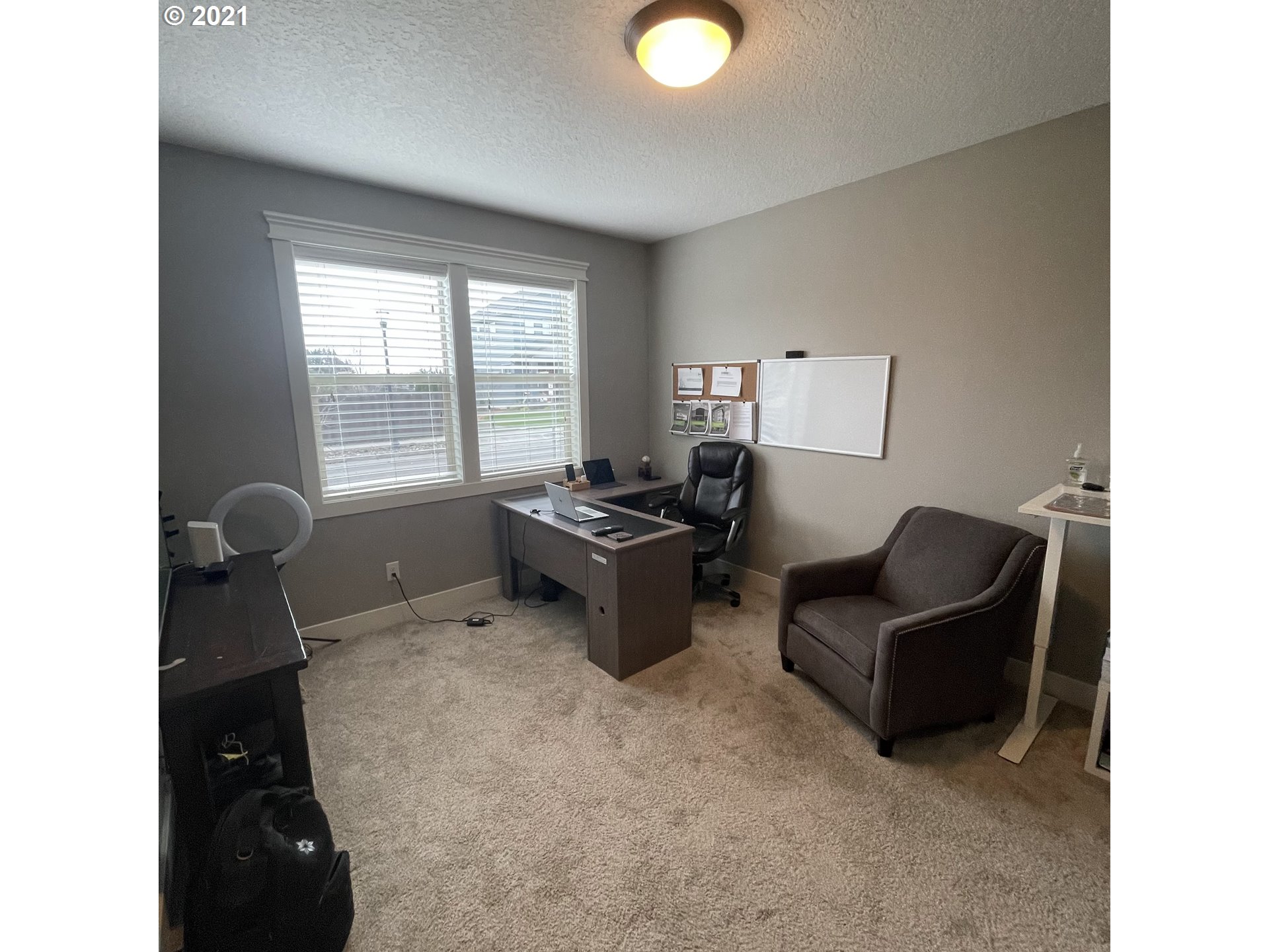 4552 North 9th Street Ridgefield, WA 98642 - Photo 18 of 29 a living room with furniture and a window