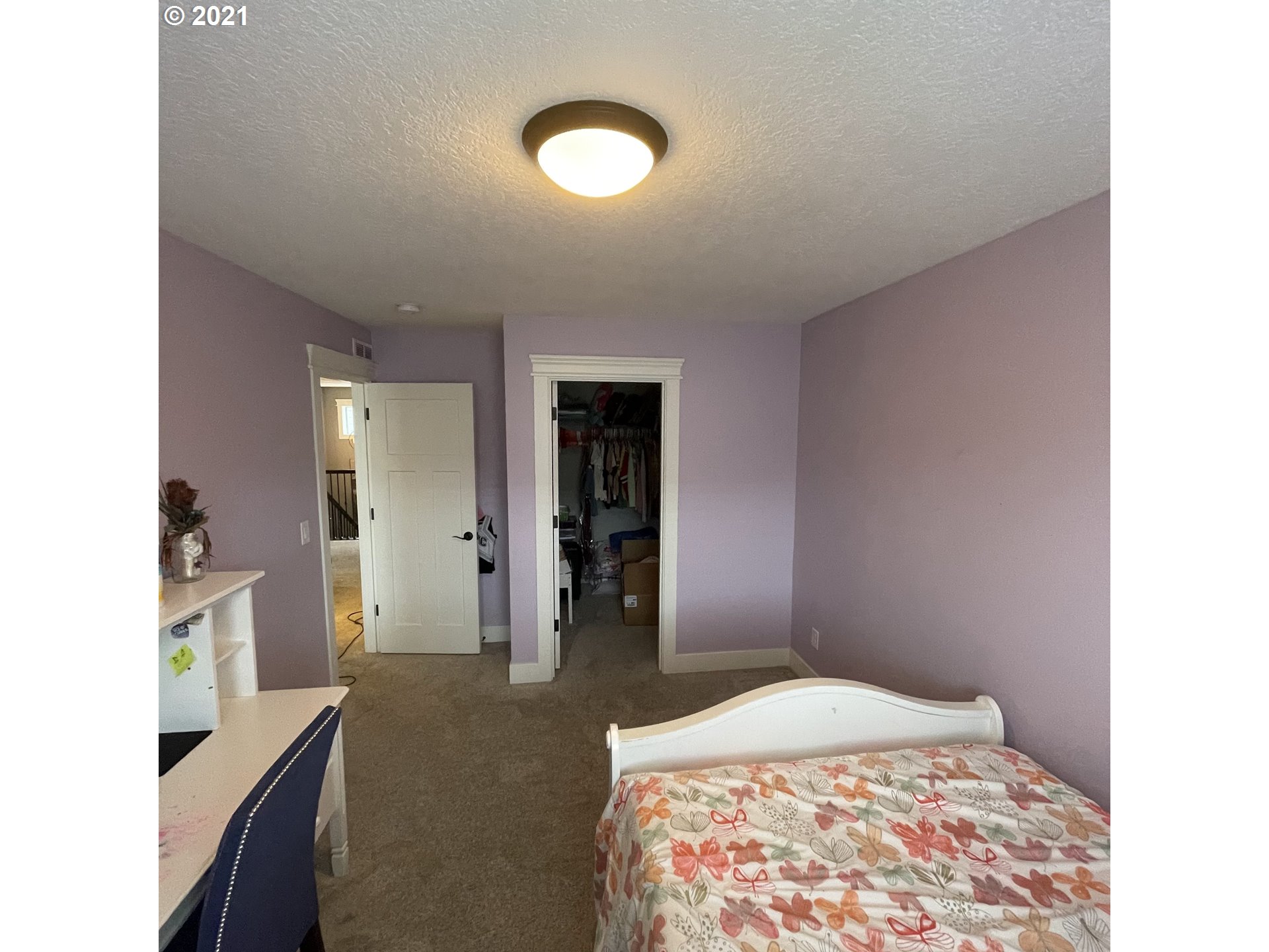 4552 North 9th Street Ridgefield, WA 98642 - Photo 20 of 29 a bedroom with bed and a window