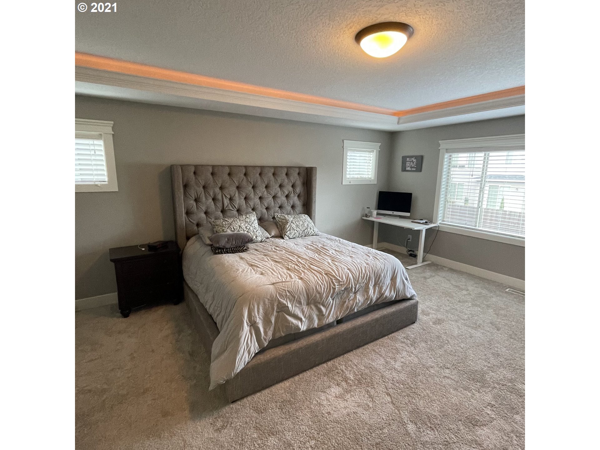 4552 North 9th Street Ridgefield, WA 98642 - Photo 21 of 29 a bedroom with a bed and chair