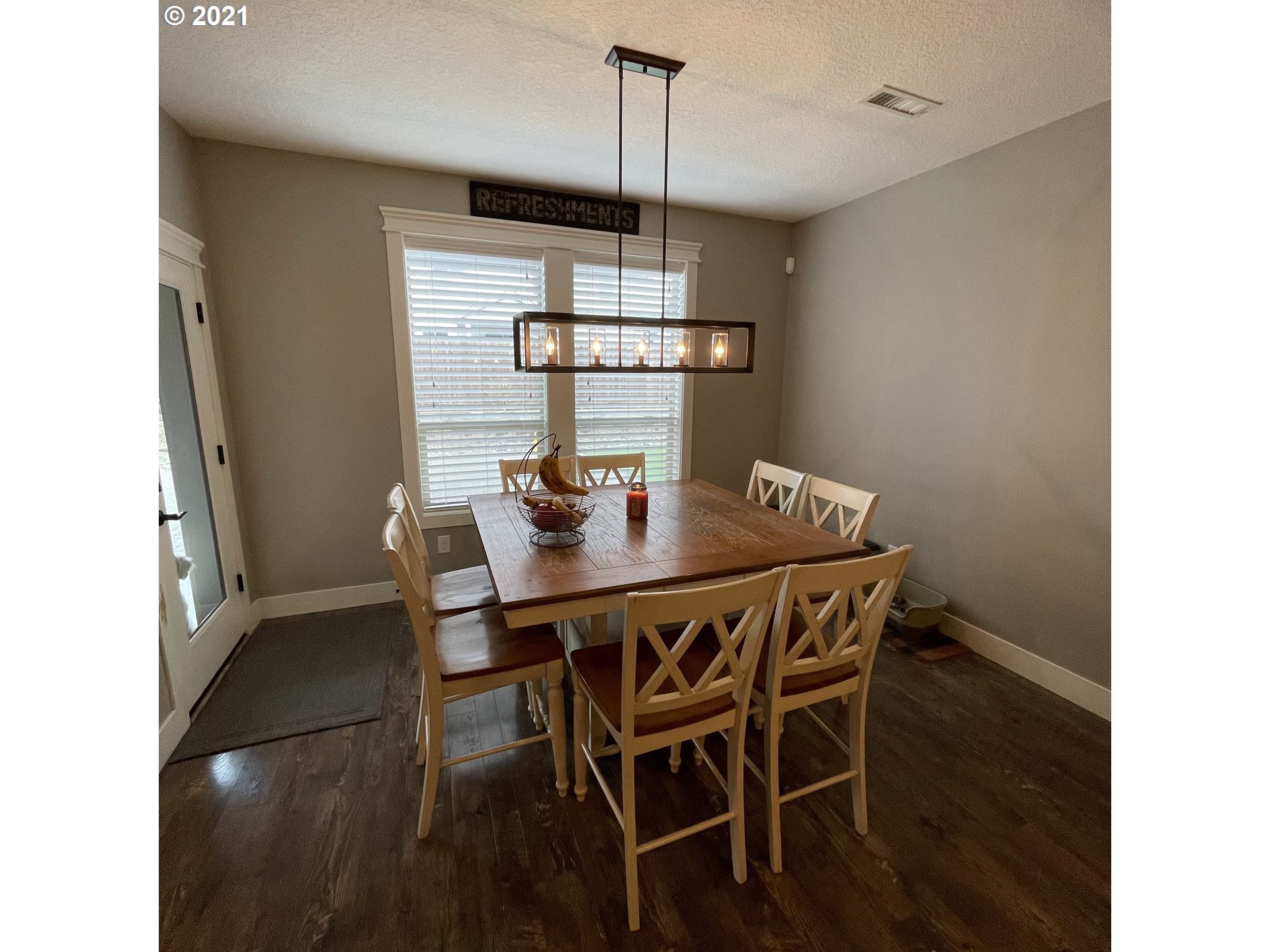 4552 North 9th Street Ridgefield, WA 98642 - Photo 8 of 29 a dining room with furniture and window