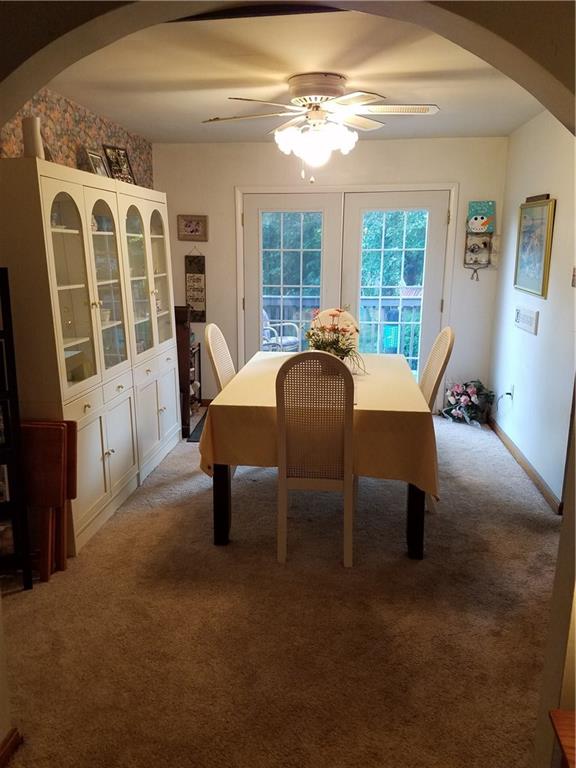 Dining Room with french doors that open up to the back deck. 