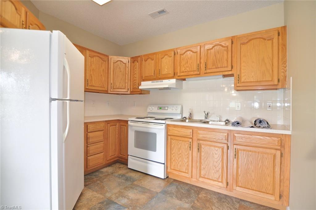 484 Hartman Road Winston-Salem, NC 27127 - Photo 29 of 30 Second kitchen in finished basement. Perfect for in-law suite