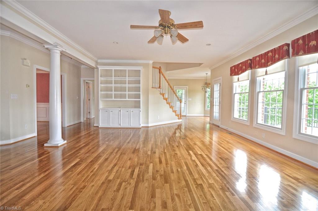 484 Hartman Road Winston-Salem, NC 27127 - Photo 10 of 30 Open living room with built in bookcase