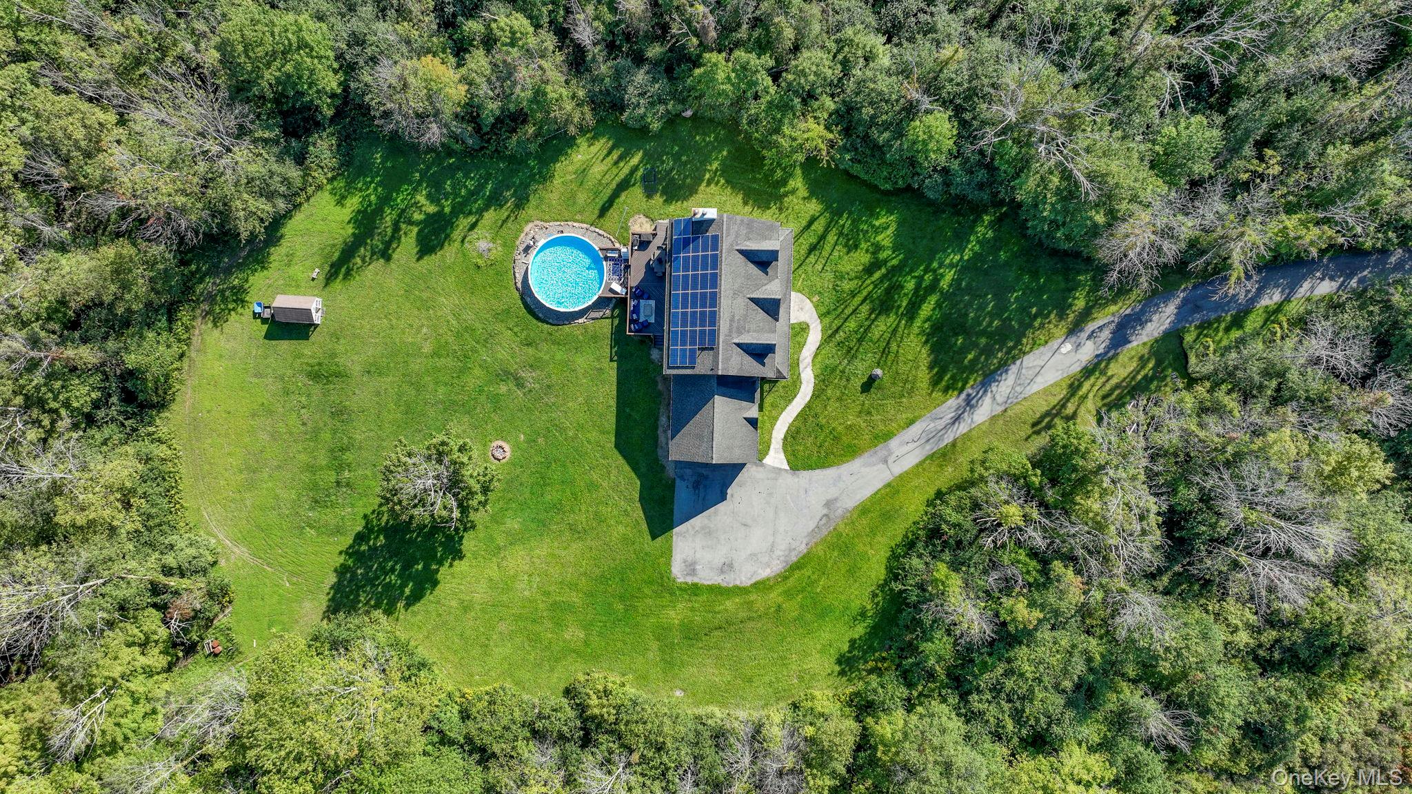 1174 Mountain Road Port Jervis, NY 12771 - Photo 1 of 34 an aerial view of a house