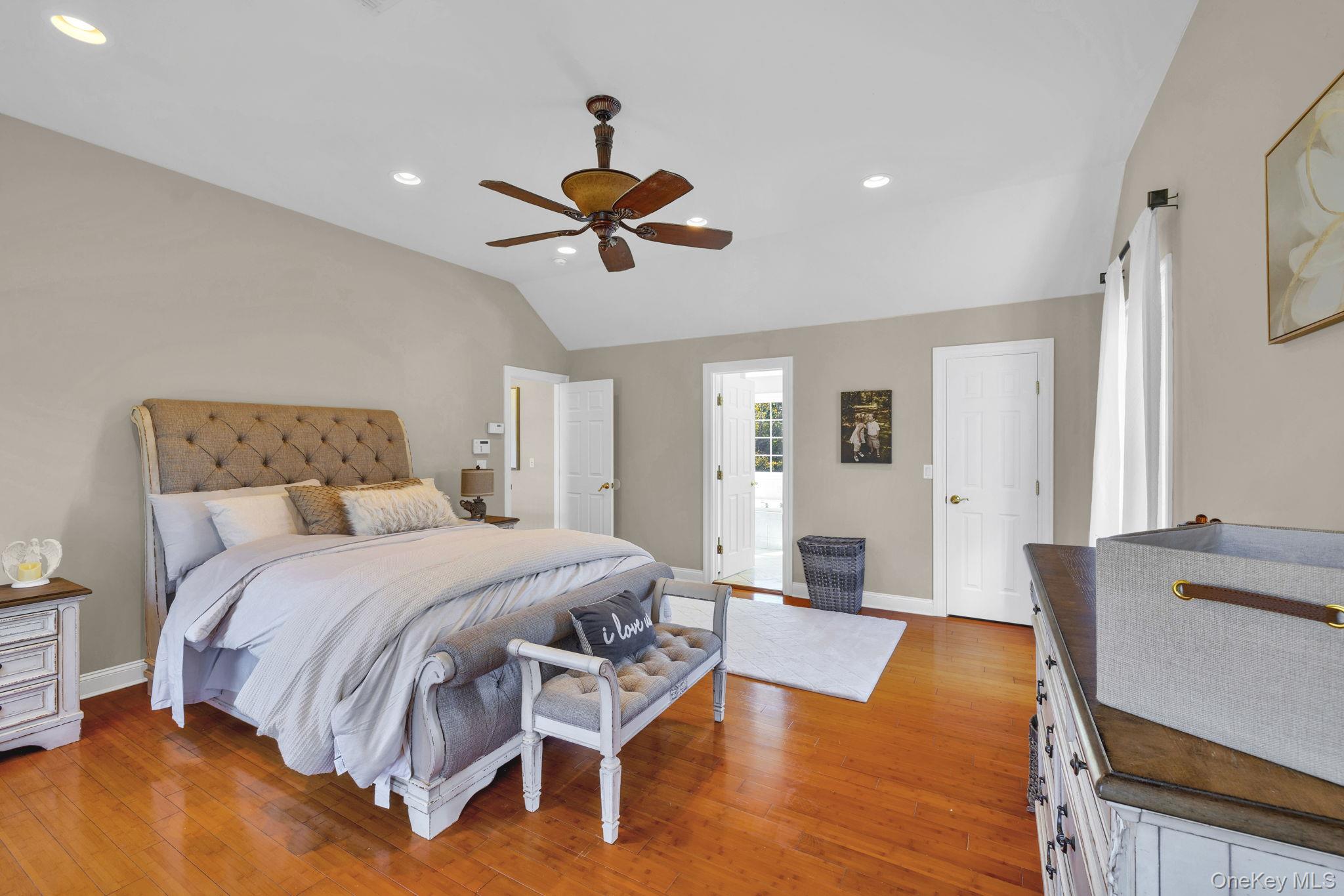 1174 Mountain Road Port Jervis, NY 12771 - Photo 20 of 34 a bedroom with a bed and wooden floor