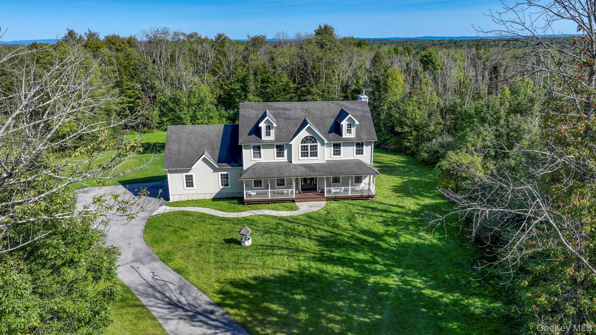1174 Mountain Road Port Jervis, NY 12771 - Photo 2 of 34 an aerial view of a house with big yard