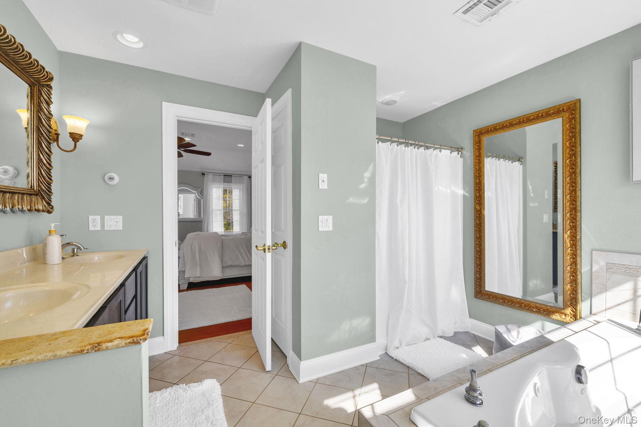 1174 Mountain Road Port Jervis, NY 12771 - Photo 23 of 34 a bathroom with a tub and shower