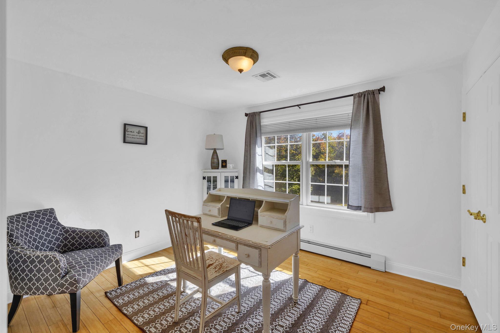 1174 Mountain Road Port Jervis, NY 12771 - Photo 27 of 34 a living room with furniture and a window