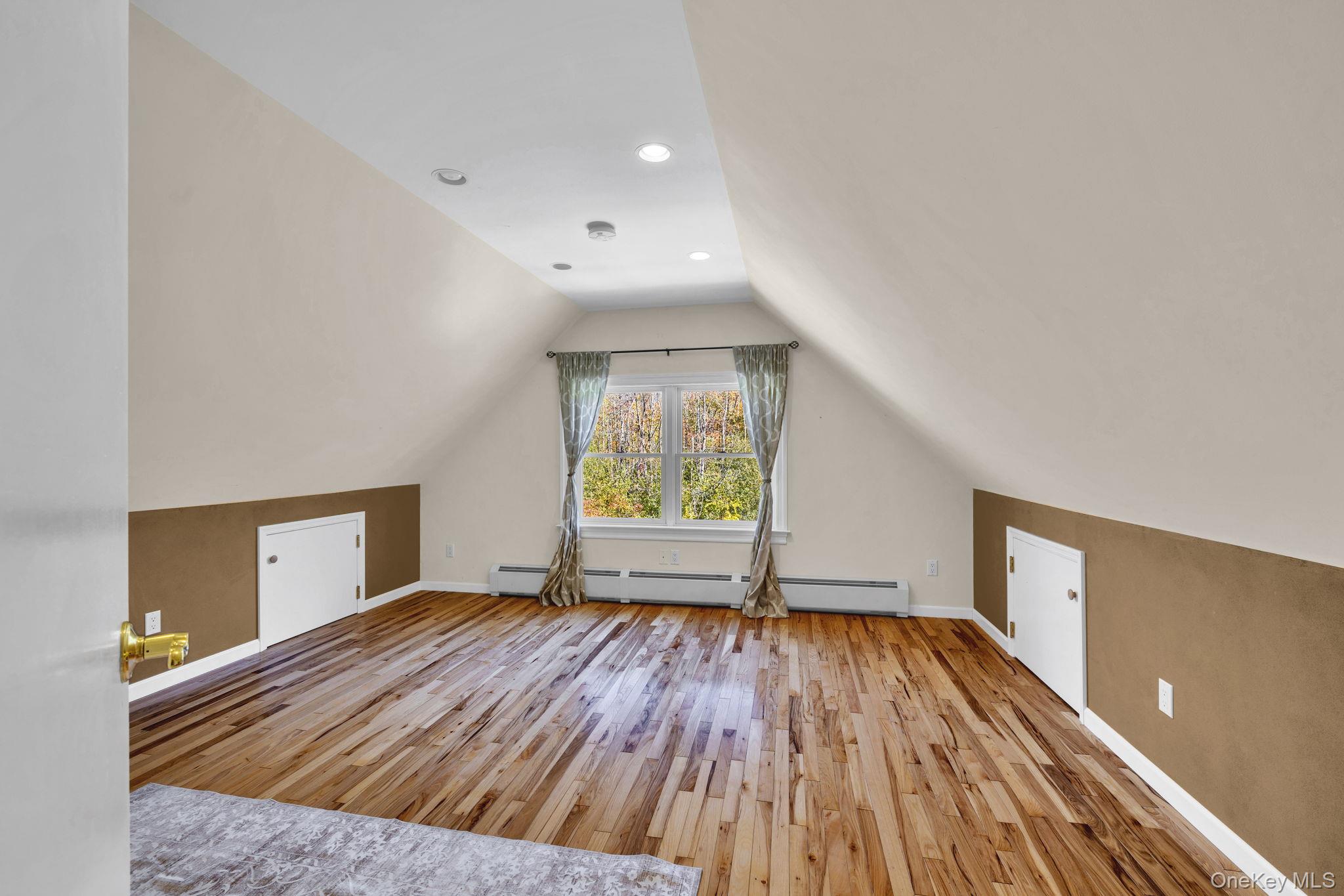 1174 Mountain Road Port Jervis, NY 12771 - Photo 30 of 34 wooden floor in an empty room with a window
