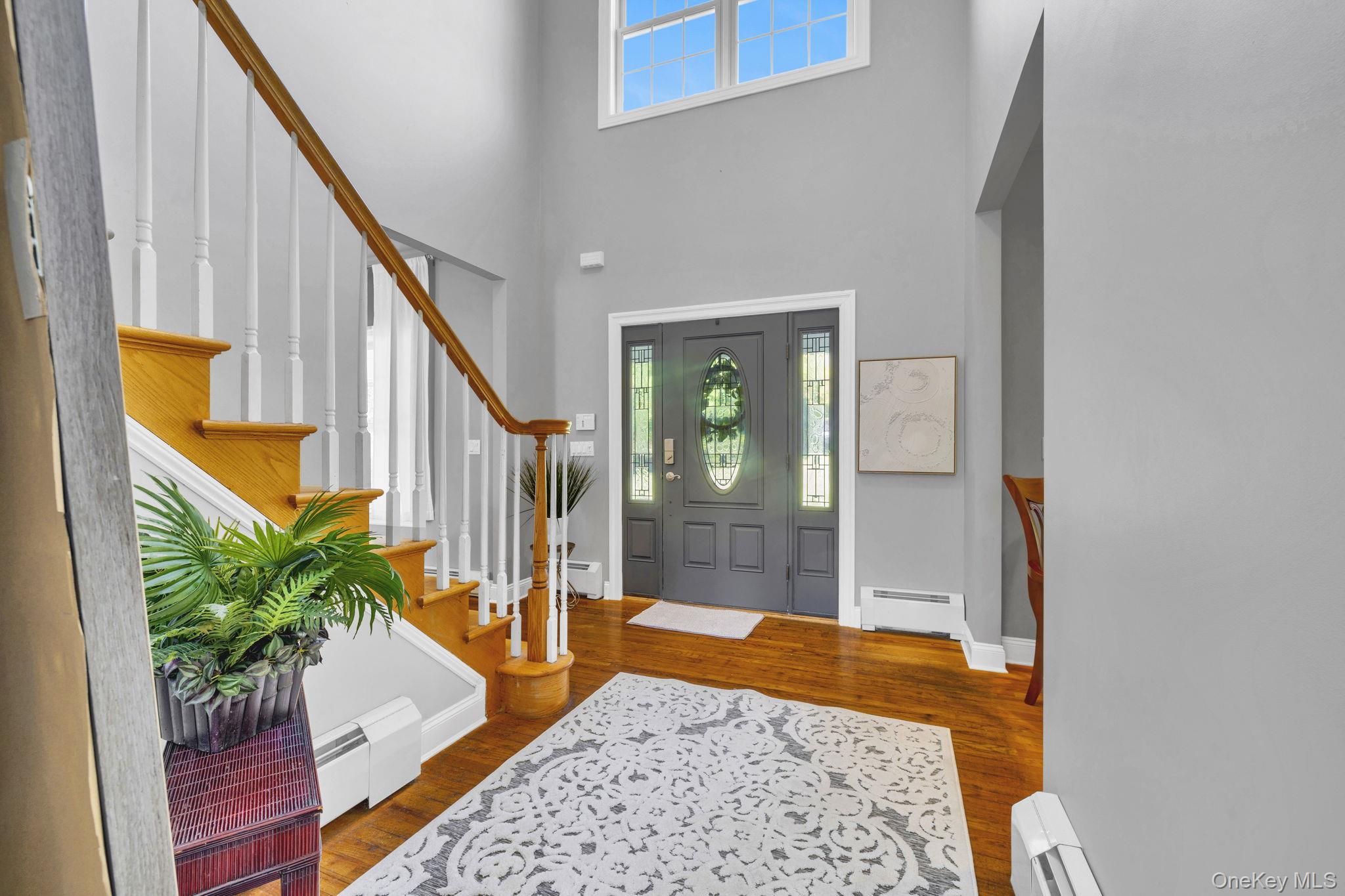 1174 Mountain Road Port Jervis, NY 12771 - Photo 5 of 34 a bedroom with a bed and a potted plant