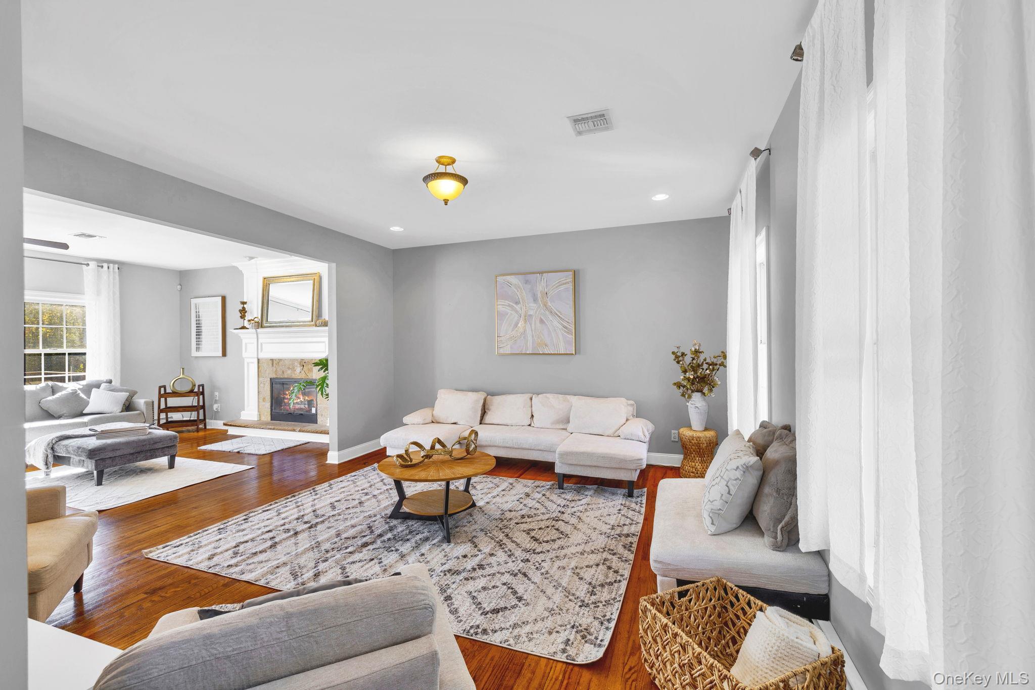 1174 Mountain Road Port Jervis, NY 12771 - Photo 6 of 34 a living room with furniture and wooden floor