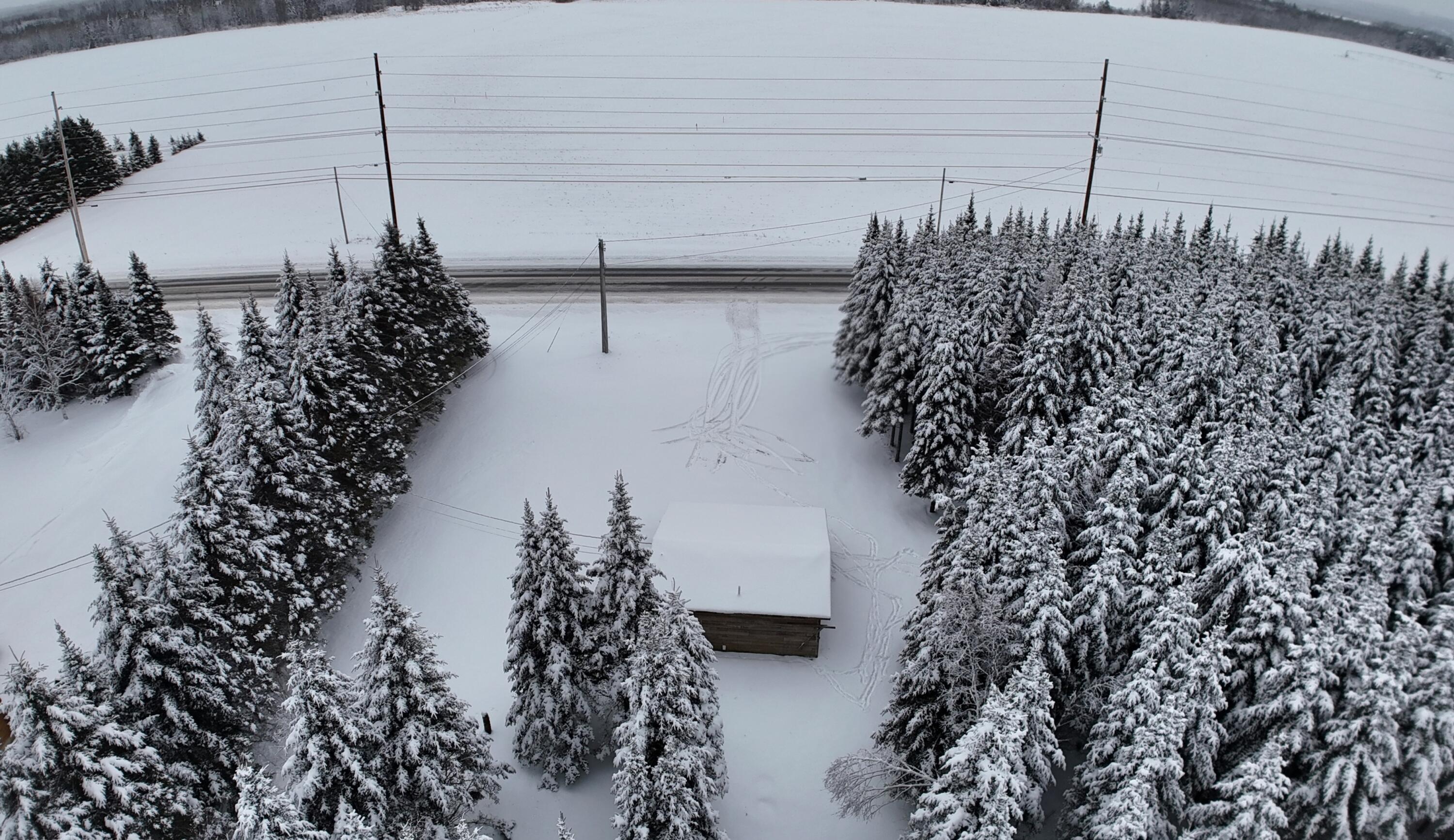 929 Access Highway Limestone, ME 04750 - Photo 8 of 19 dji_fly_20260101_144450_0180_17673001744