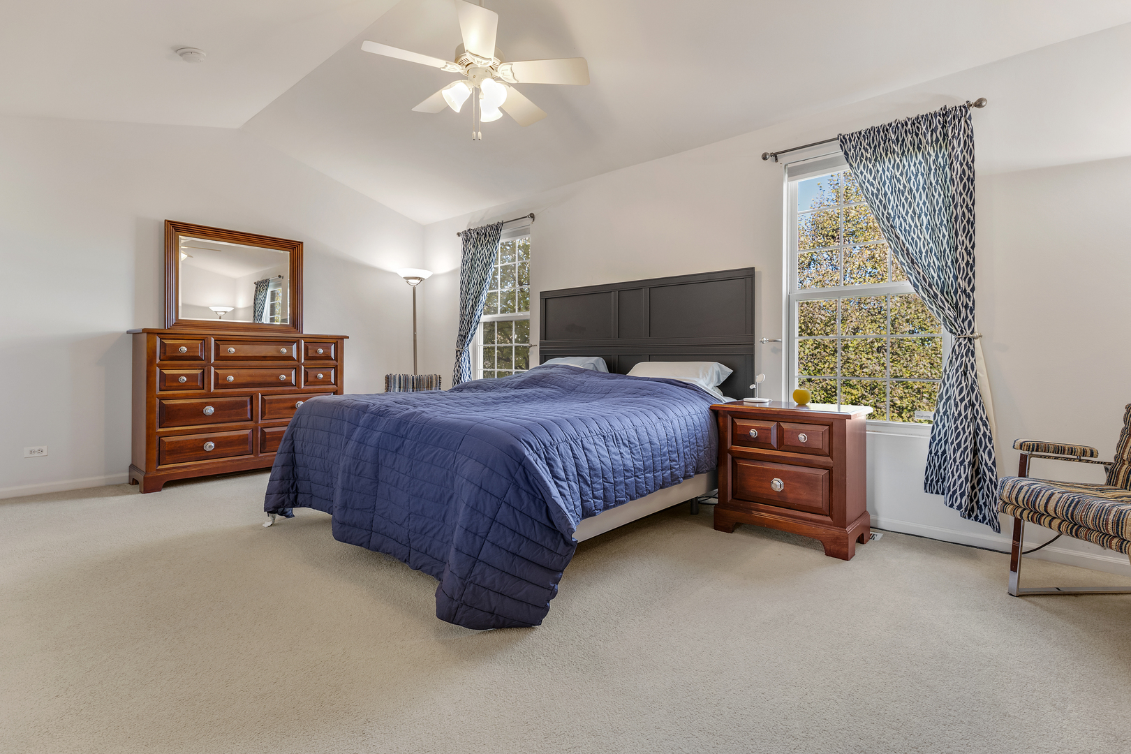 2451 Anna Way Elgin, IL 60124 - Photo 15 of 26 a bedroom with a bed and a chandelier