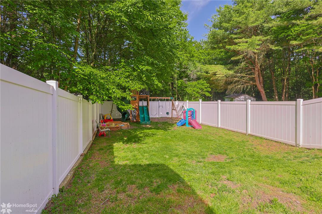 60 Sassafras Road Lehighton, PA 18235 - Photo 42 of 51 A well-maintained fenced yard offers a private and verdant outdoor sanctuary.