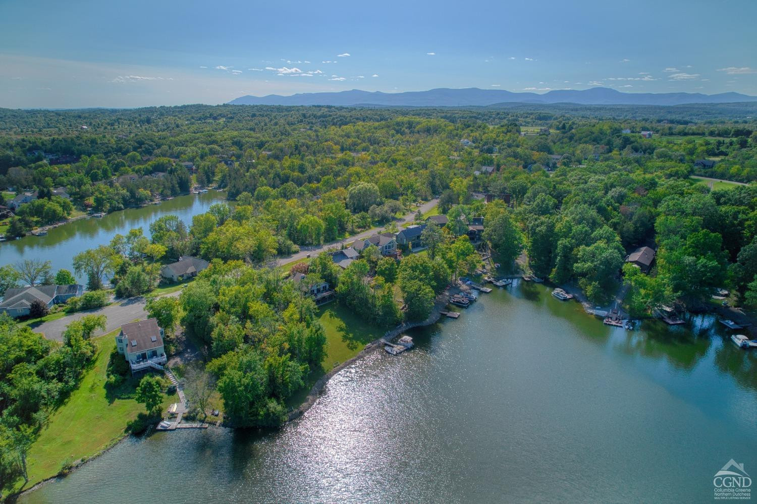 107 Whitney Point Athens, NY 12015 - Photo 7 of 17 a view of a city with lush green forest