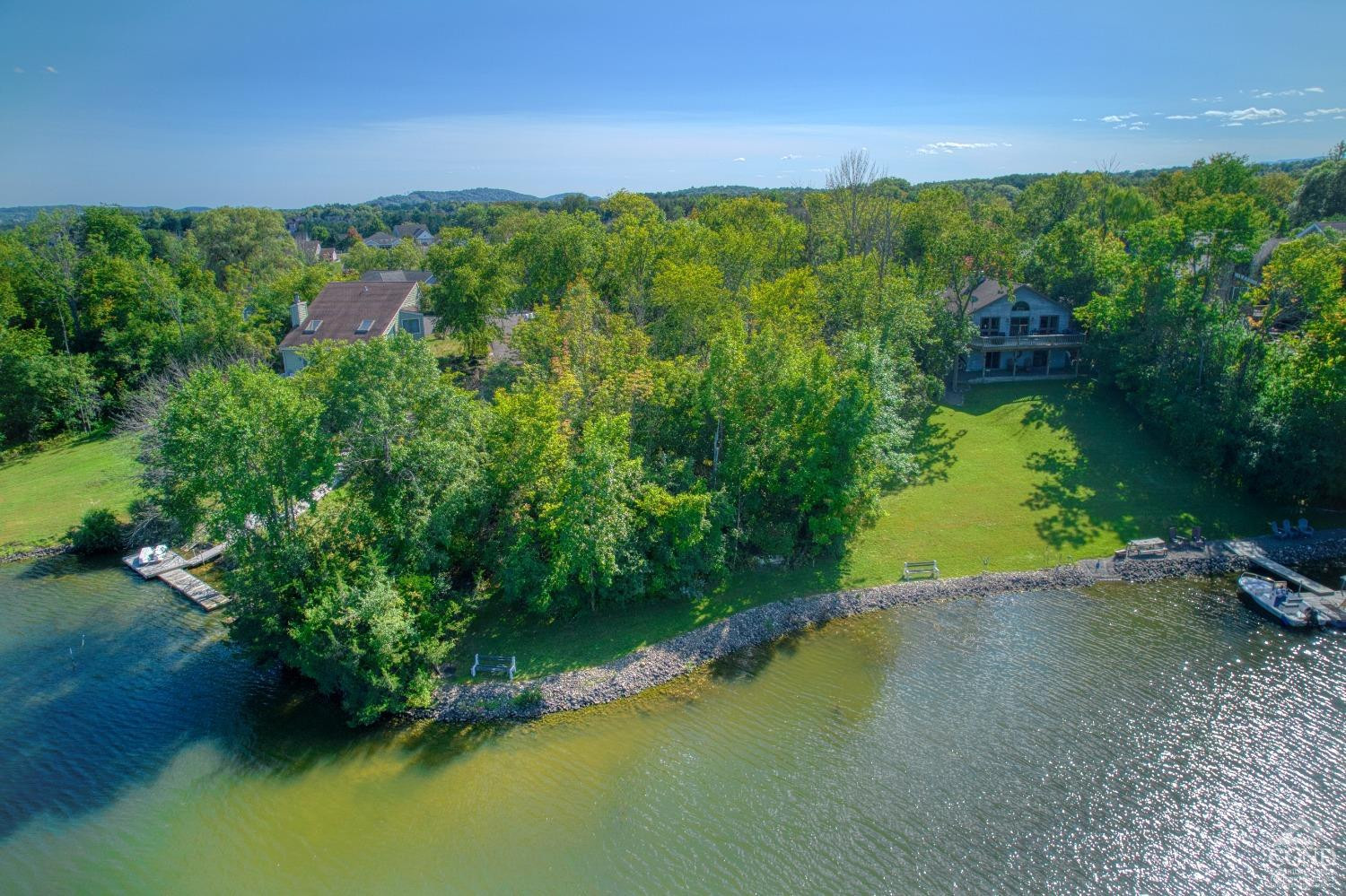 107 Whitney Point Athens, NY 12015 - Photo 8 of 17 a view of a lake with a yard