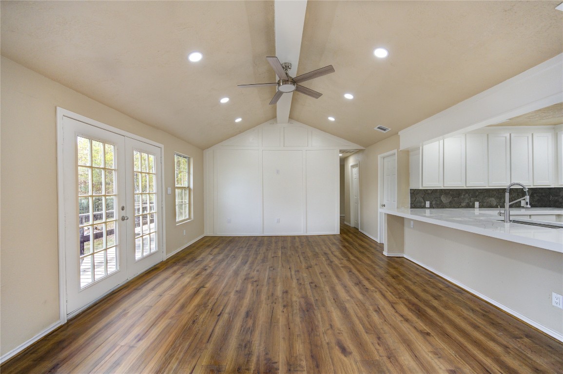 235 6th Street Trinity, TX 75862 - Photo 12 of 29 a view of a kitchen with wooden floor and a sink