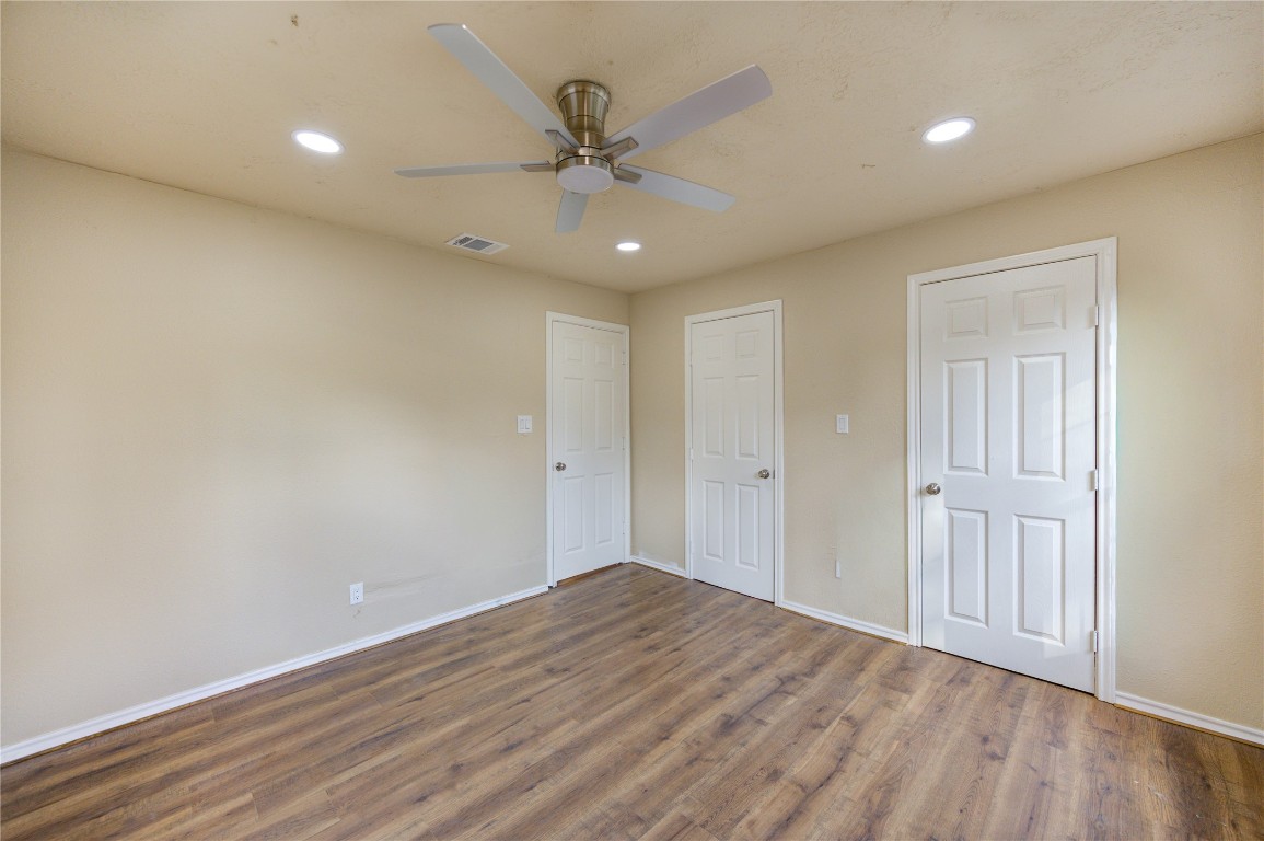 235 6th Street Trinity, TX 75862 - Photo 16 of 29 wooden floor in an empty room with a window