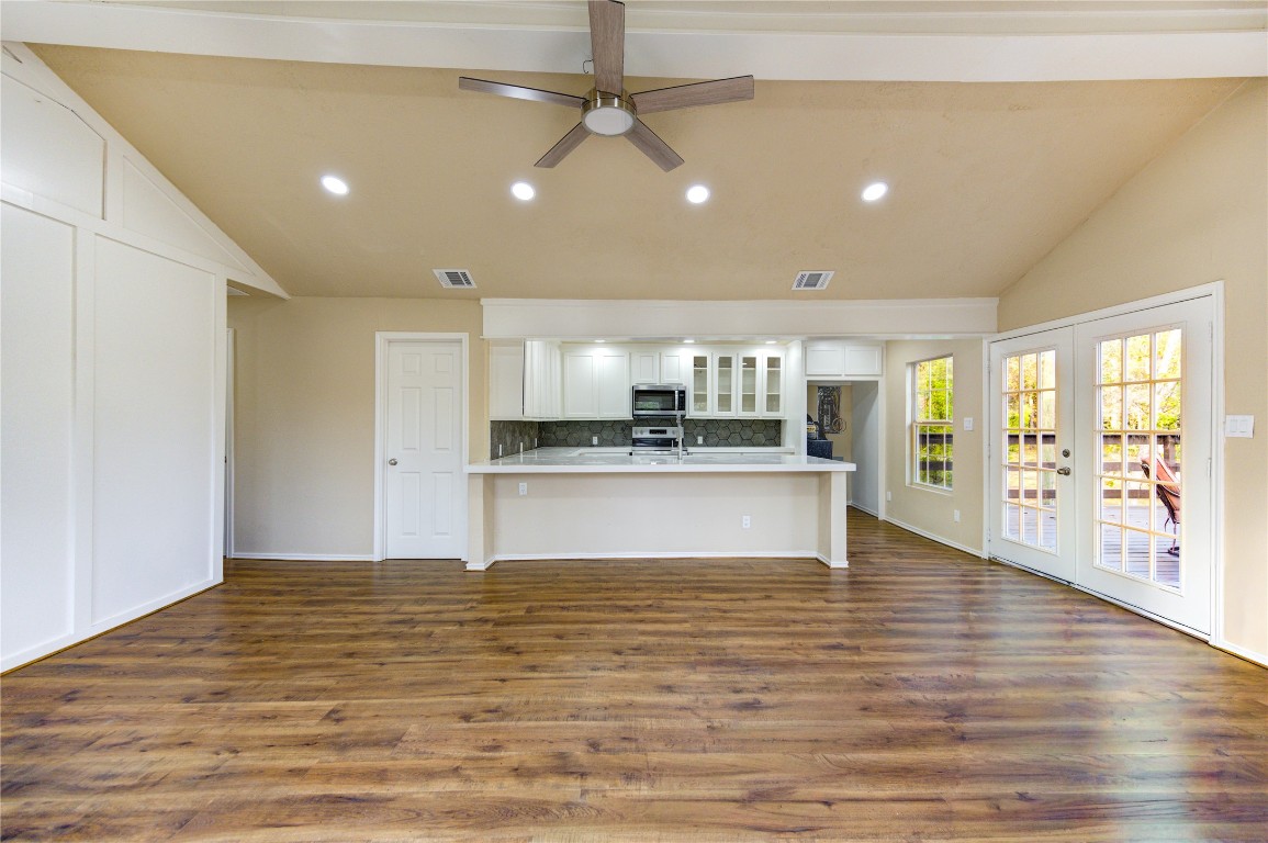 235 6th Street Trinity, TX 75862 - Photo 8 of 29 a view of kitchen with stove and refrigerator