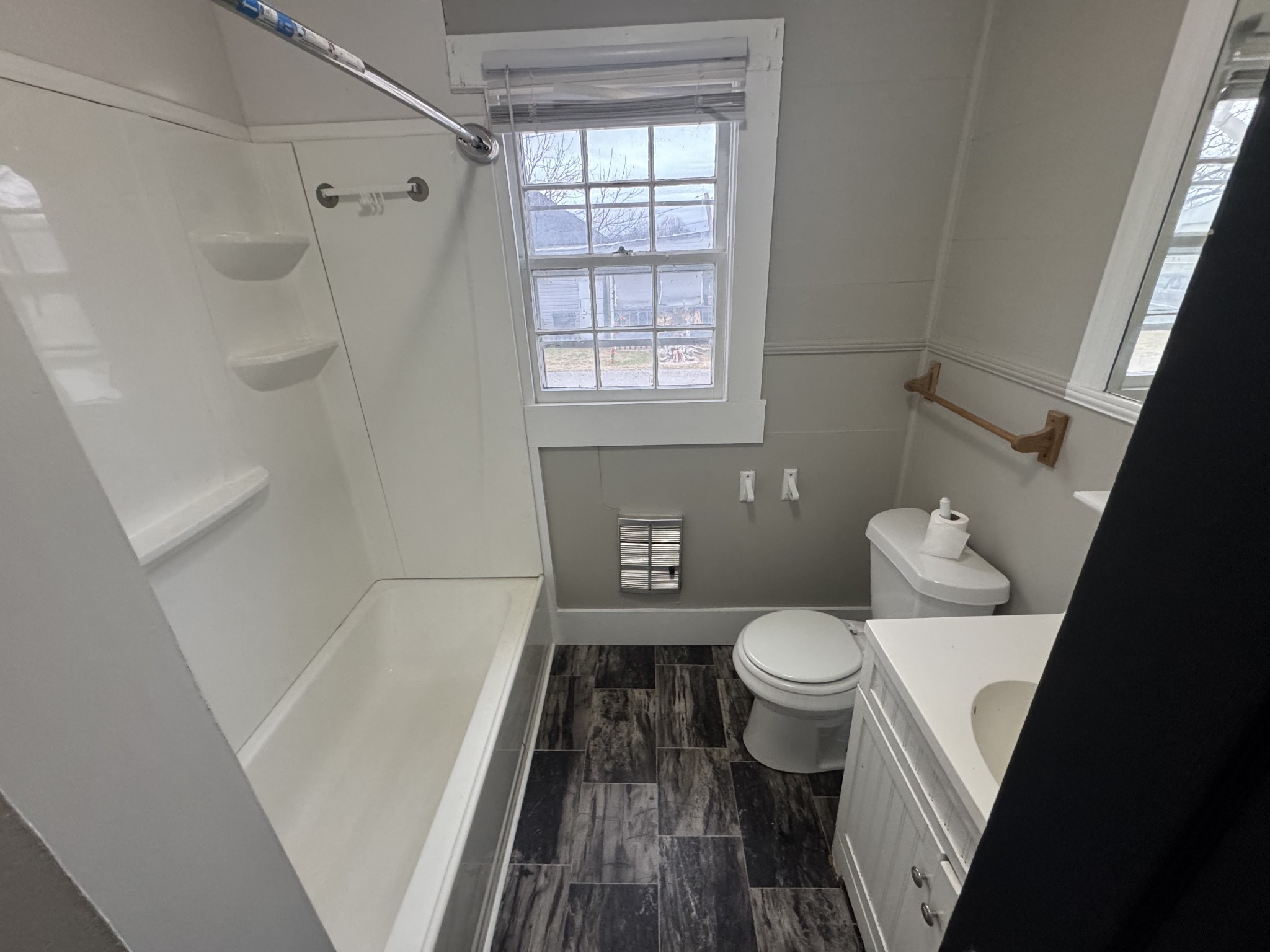 835 Bridge Avenue, Unit B Murfreesboro, TN 37129 - Photo 4 of 10 a bathroom with a sink and a toilet