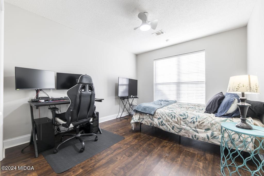 104 Weatherwood Road Kathleen, GA 31047 - Photo 24 of 35 a bedroom with a bed and a window