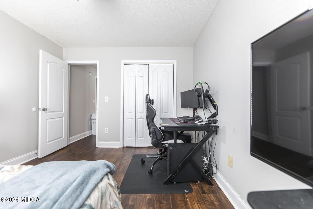 104 Weatherwood Road Kathleen, GA 31047 - Photo 25 of 35 a view of a workspace with furniture and wooden floor