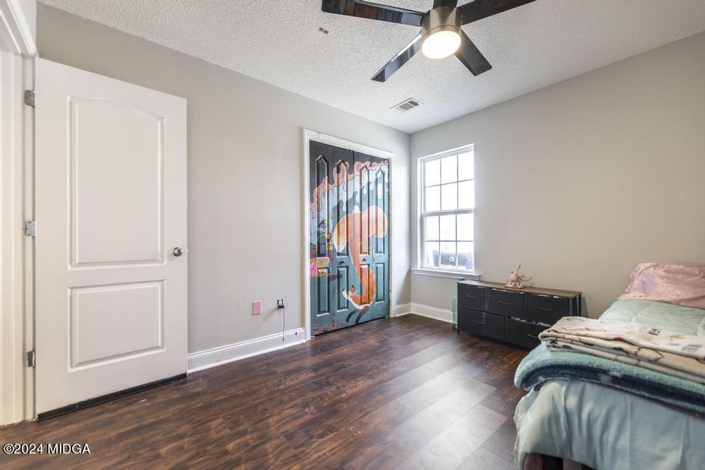 104 Weatherwood Road Kathleen, GA 31047 - Photo 28 of 35 a bedroom with furniture and a window