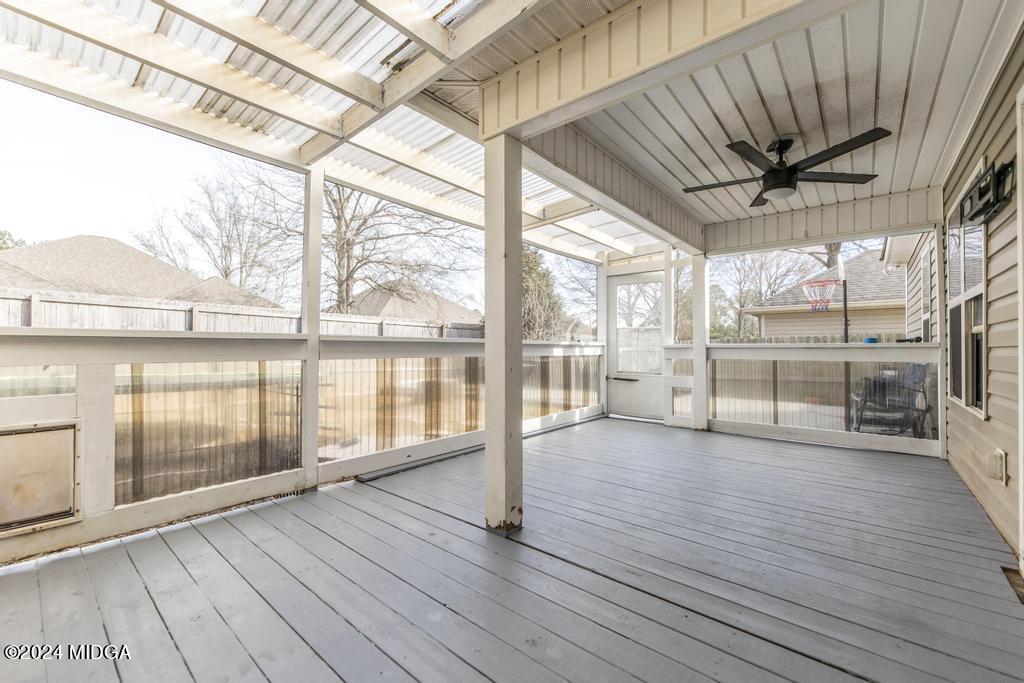 104 Weatherwood Road Kathleen, GA 31047 - Photo 29 of 35 a view of interior space with wooden floor and lake view
