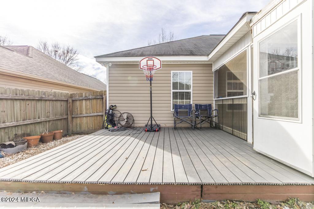 104 Weatherwood Road Kathleen, GA 31047 - Photo 31 of 35 a view of a house with a barbeque and wooden stairs