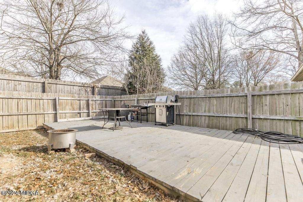 104 Weatherwood Road Kathleen, GA 31047 - Photo 32 of 35 a swimming pool with outdoor seating and yard