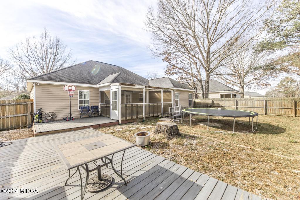 104 Weatherwood Road Kathleen, GA 31047 - Photo 34 of 35 a view of a house with backyard and sitting area