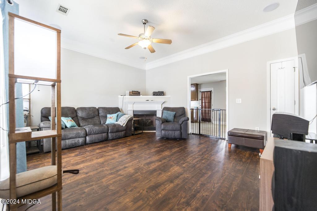 104 Weatherwood Road Kathleen, GA 31047 - Photo 7 of 35 a living room with furniture and a large window