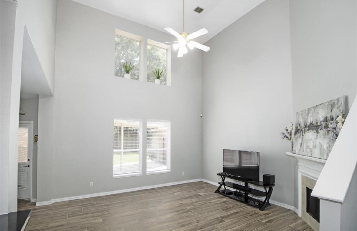 25507 Lyon Springs Court Spring, TX 77373 - Photo 5 of 9 a view of livingroom with workspace