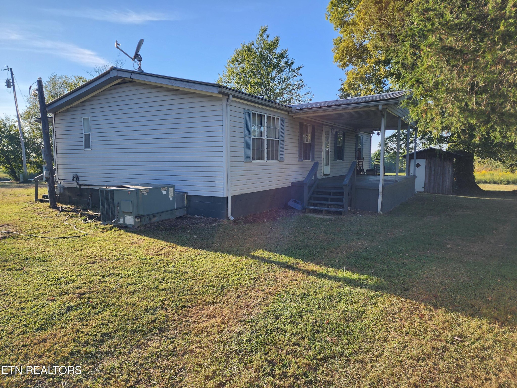 199 Carson Pugh Road Crossville, TN 38571 - Photo 2 of 58 a view of a house with a yard