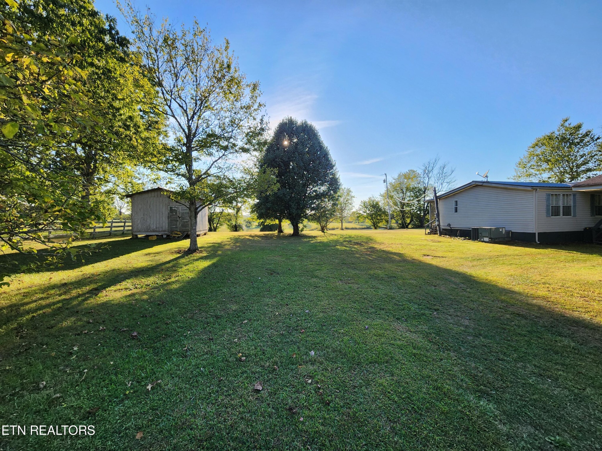 199 Carson Pugh Road Crossville, TN 38571 - Photo 4 of 58 a view of a house with a big yard