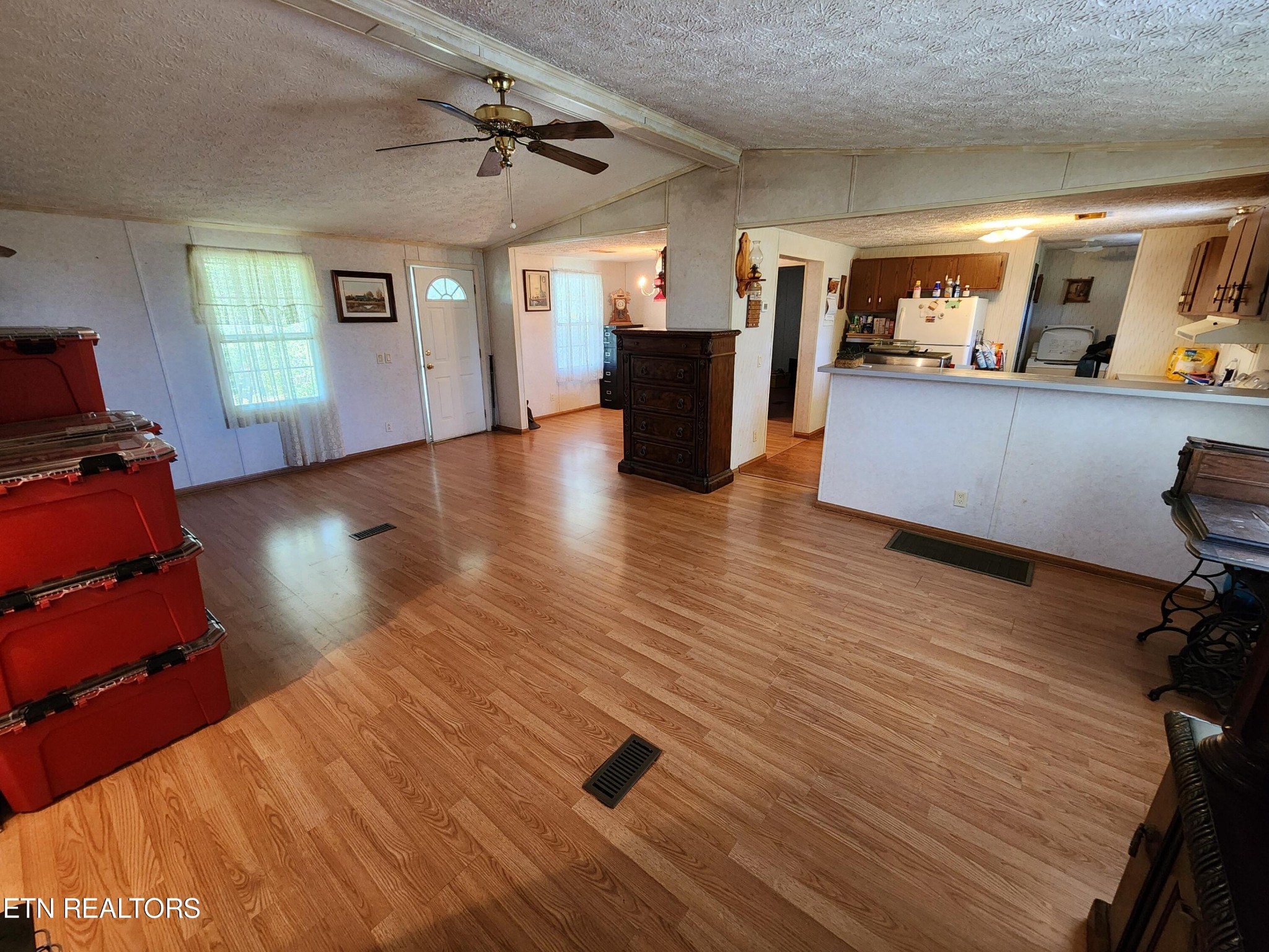 199 Carson Pugh Road Crossville, TN 38571 - Photo 42 of 58 a view of a livingroom with furniture and wooden floor