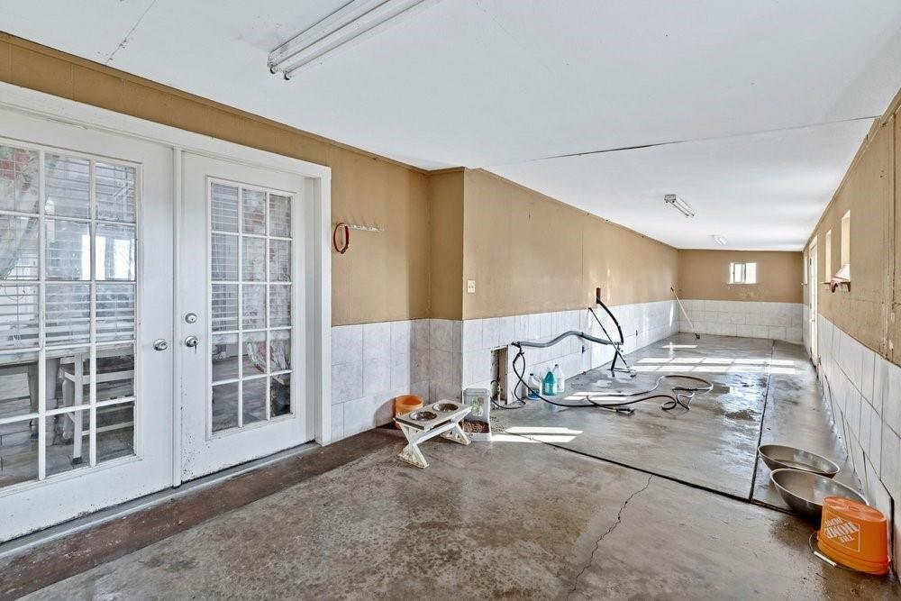 7709 Fm 902 Sherman, TX 75092 - Photo 22 of 39 a view of a room with gym equipment