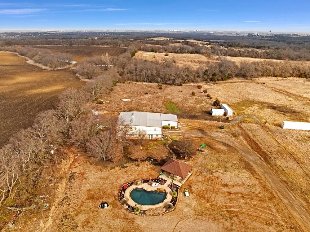 7709 Fm 902 Sherman, TX 75092 - Photo 31 of 39 an aerial view of residential houses with outdoor space