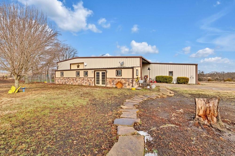7709 Fm 902 Sherman, TX 75092 - Photo 4 of 39 a view of a house with backyard