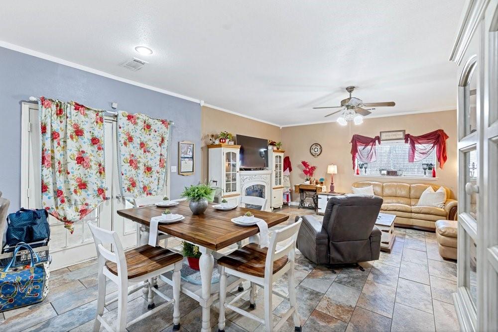 7709 Fm 902 Sherman, TX 75092 - Photo 8 of 39 a living room with furniture and a flat screen tv