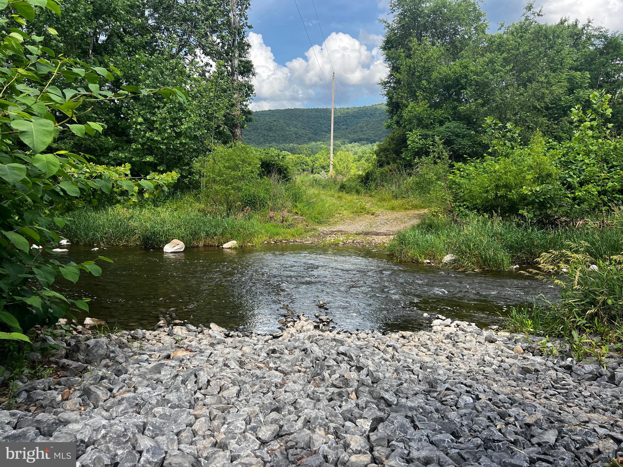 12125 State Road 259 Mathias, WV 26812 - Photo 1 of 40 Entrance - property begins middle of stream