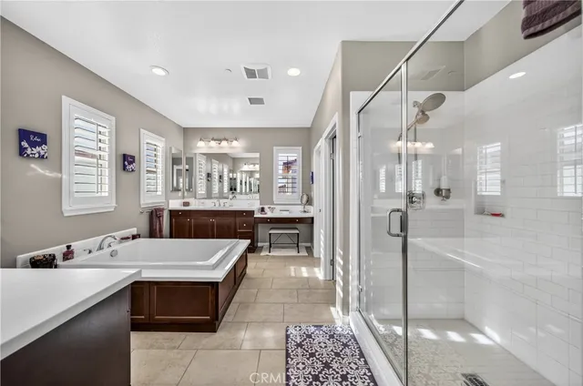 a large hall with a large mirror and sink