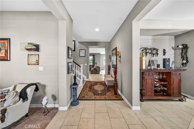 a view of a livingroom with storage & utility room