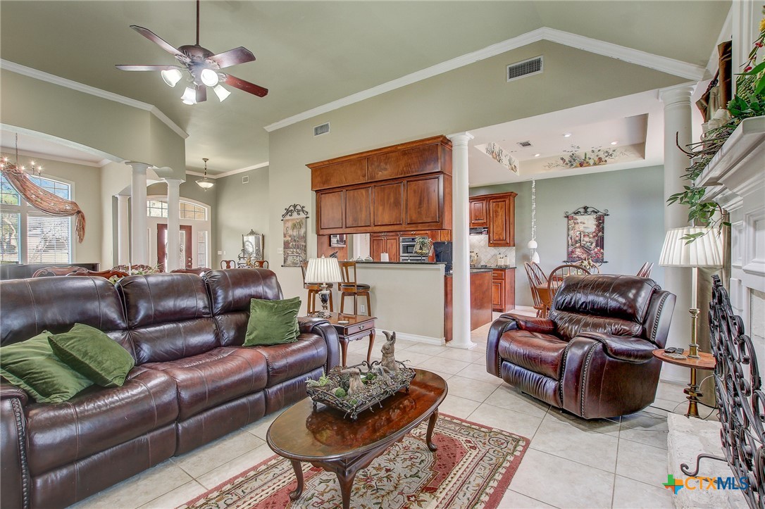 200 Carriage House Road Salado, TX 76571 - Photo 11 of 43 a living room with furniture and a chandelier