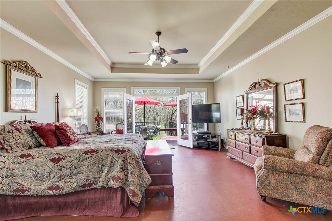 200 Carriage House Road Salado, TX 76571 - Photo 19 of 43 Master opens to patio overlooking wet weather creek