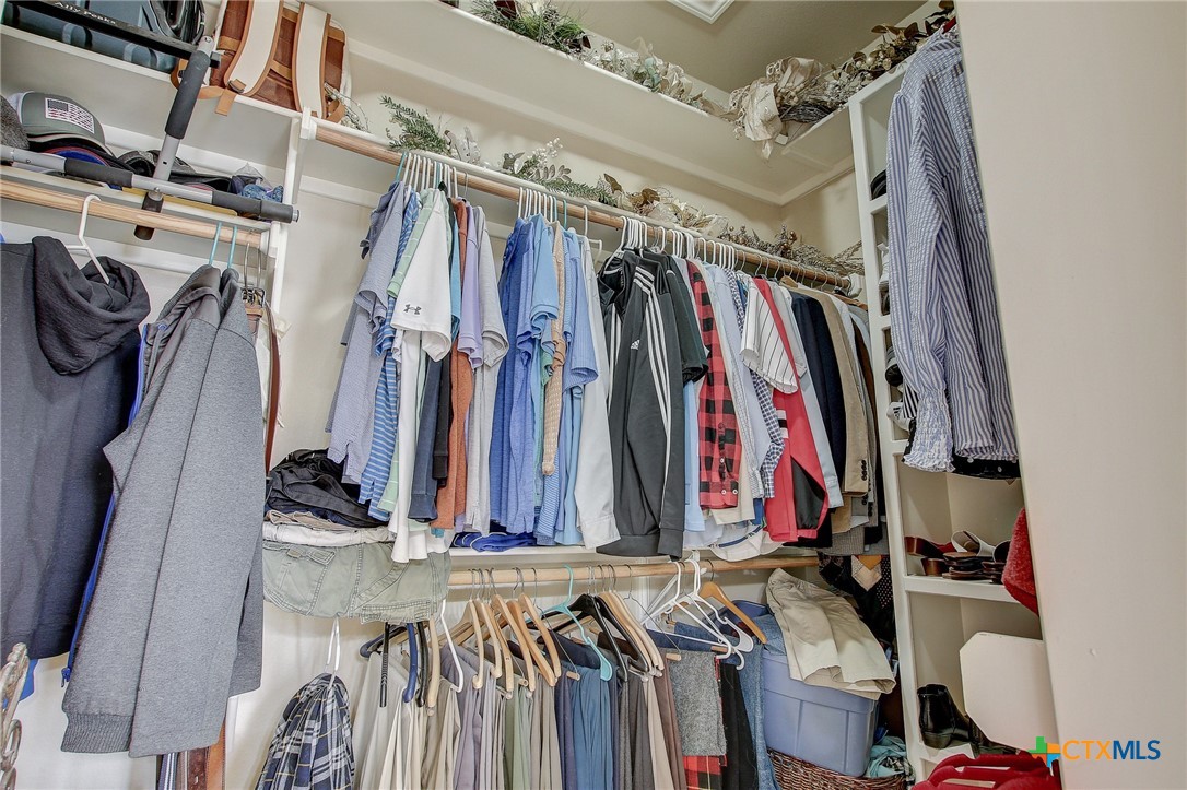 200 Carriage House Road Salado, TX 76571 - Photo 23 of 43 a view of walk in closet with clothes